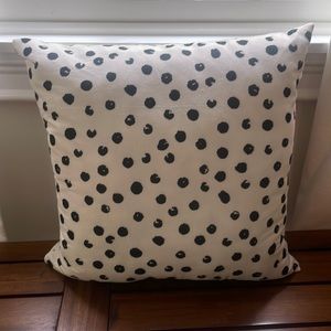 Black and white spotted pillow